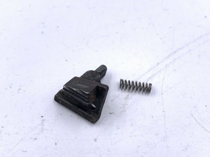 Jimenez J.A. 9 9mm Pistol, Disassembly button and a spring