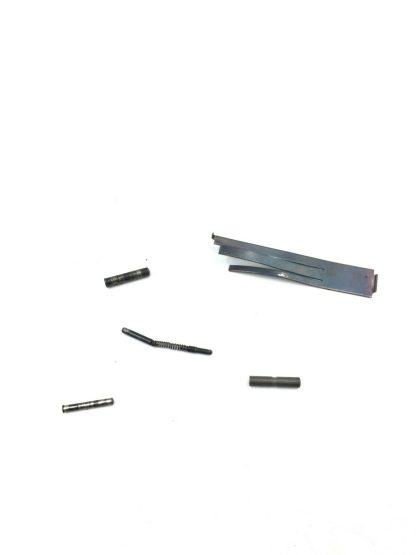 Colt series 70 45 acp, pistol parts, plunger, pins, and spring