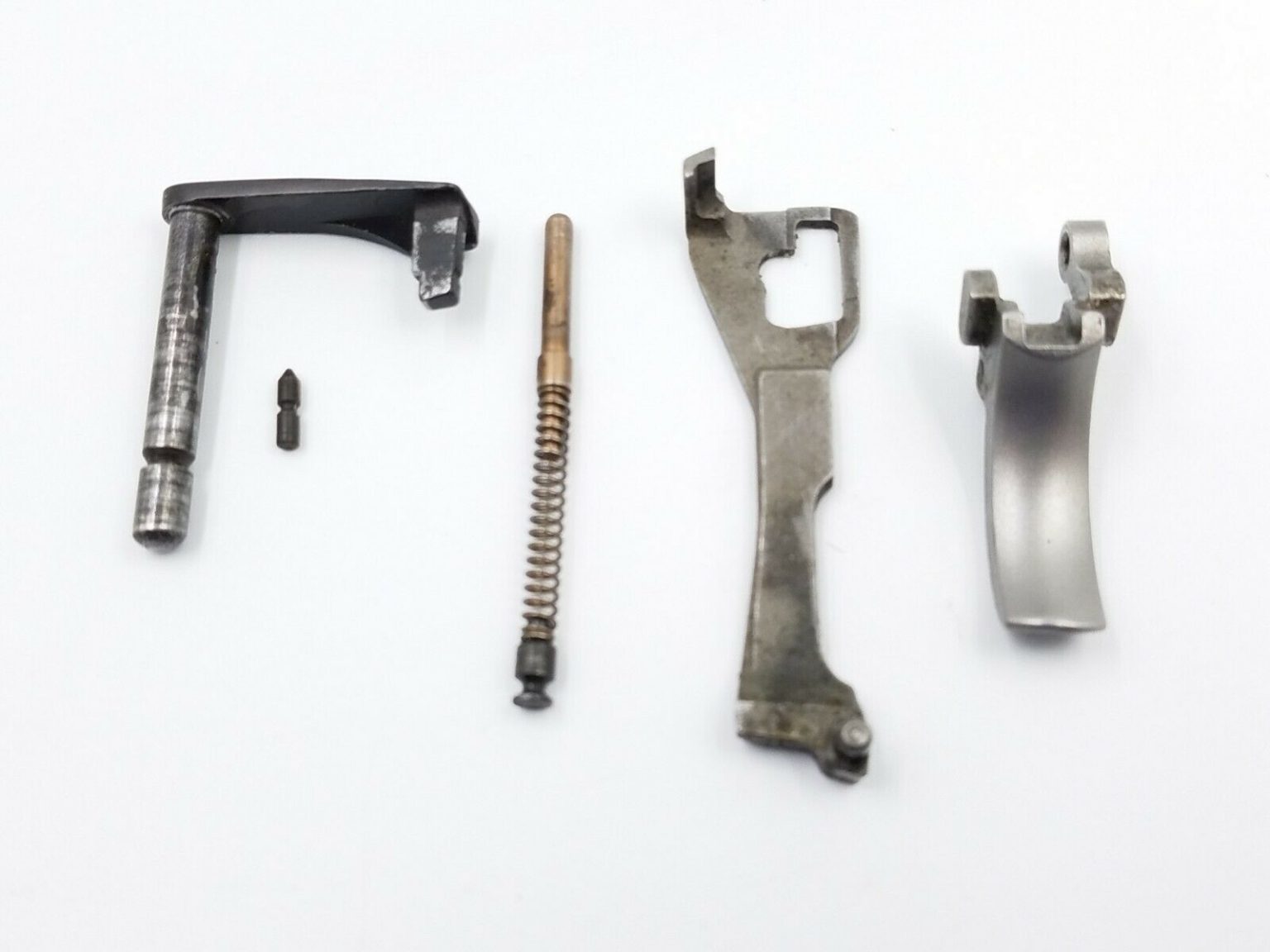 Ruger P89 9MM Pistol PartsTrigger, Bar, Plunger, Spring, Retainer and