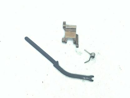 Ruger P90DC 45ACP pistol parts, lever, spring, and hammer strut
