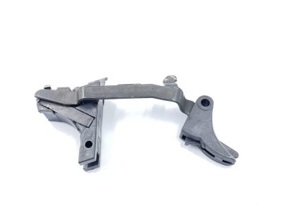 Glock Model 22, 40 cal. pistol parts, trigger, pins, spring, slide stop lever, mag. catch, and barrel stop - Image 9
