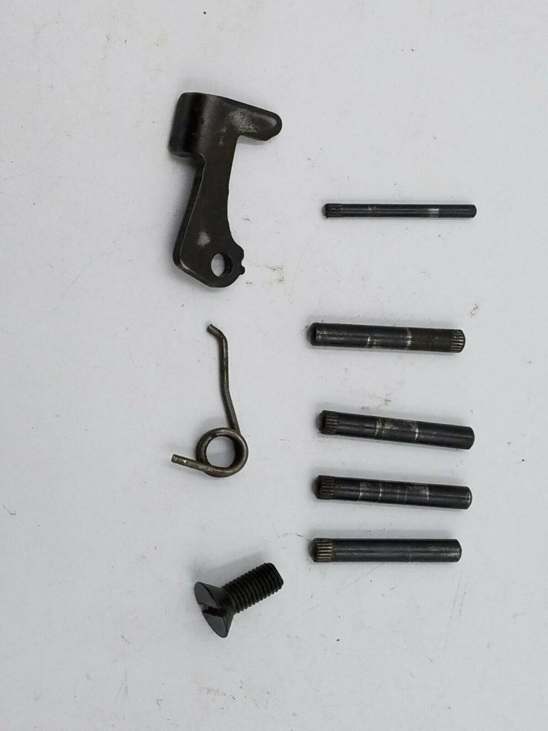 H&R 88 12 Gauge, shotgun parts, release lever, pins, spring, and screw