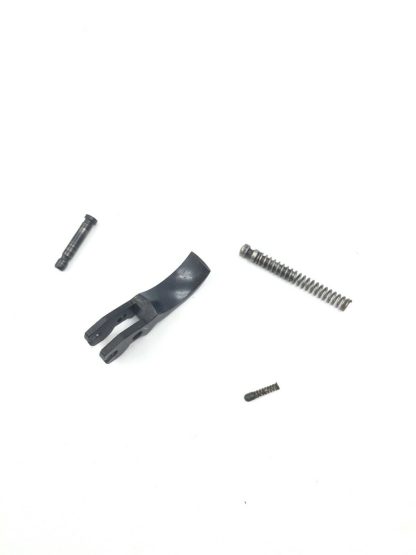 KBI Model GKK-92C 9mm, pistol parts, trigger, spring, and pin