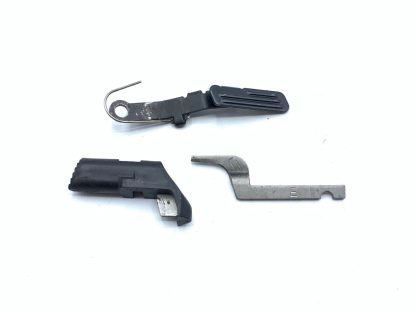 Smith & Wesson SW40VE 40S&W pistol parts: slide catch, mag catch, & ejector - Image 2