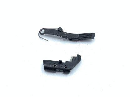 Smith & Wesson SW40VE 40S&W pistol parts: slide catch, mag catch, & ejector - Image 4