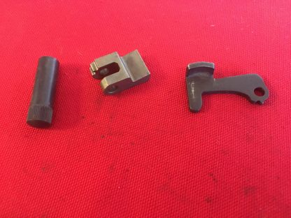 New England model Pardner 20-ga shotgun parts,  pin, barrel catch, and release lever.