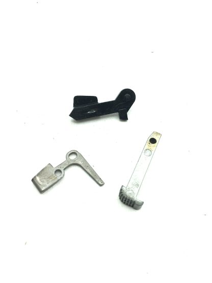 Bryco 38 380acp pistol parts, safety, mag. catch, and cam - Image 5