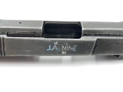 Jimenez J.A. 9 9mm pistol parts, slide, barrel, and recoil spring - Image 6