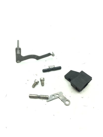 Smith & Wesson 4586, 45 Acp Pistol Part. Sideplate, Lever, Seat, Screws, & Pins