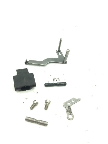 Smith & Wesson 4586, 45 Acp Pistol Part. Sideplate, Lever, Seat, Screws, & Pins - Image 4