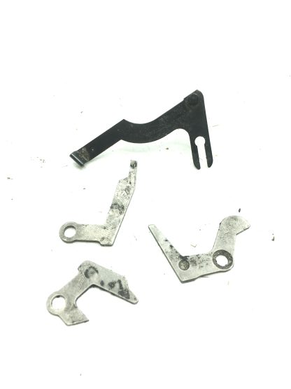 Smith & Wesson 3914 9mm pistol parts: ejector, levers, & sideplate