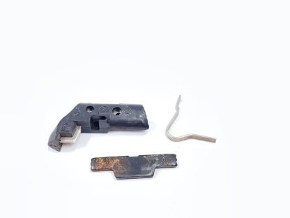 Smith And Wesson SW9VE 9mm pistol parts, mag. catch, barrel stop, and spring