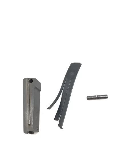 IAI Model M5000 45acp, pistol parts, mainspring housing, pin, and spring