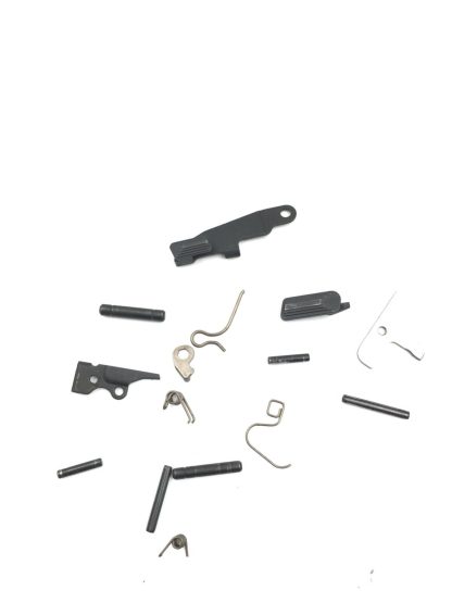 Springfield XDE-45 3.3 45acp, pistol parts, slide catch, pins, spring, and lever