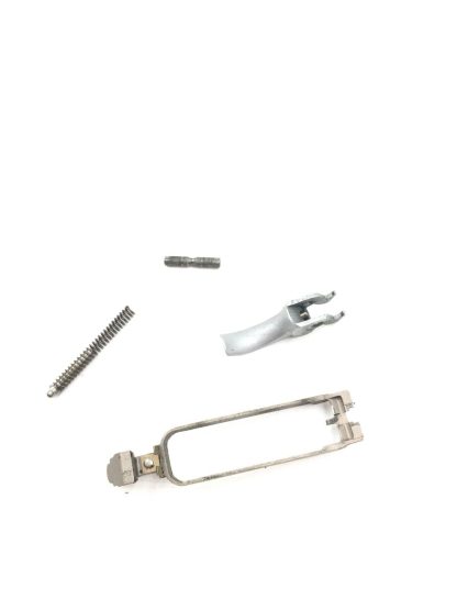 Smith and Wesson 1086 10mm, pistol parts, trigger, drawbar, pin, and spring