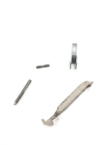 Smith and Wesson 1086 10mm, pistol parts, trigger, drawbar, pin, and spring - Image 2