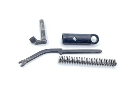 Ruger P85 9mm pistol parts, hammer pivot, strut, spring, and seat