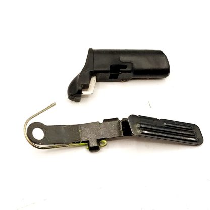 Smith & Wesson SD4OVE, 40 S & W Pistol Part. Magazine Catch, Slide Stop