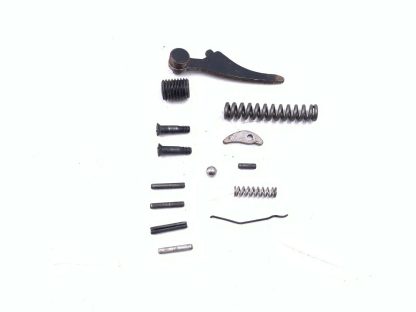 CDM 22 Short pistol parts: mainspring, guide, kicker, pins, screws