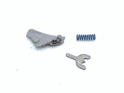 Smith & Wesson 317-3 22LR pistol parts: arm, clip, spring