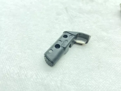 Smith & Wesson SD40VE, 40S&W pistol parts: Magazine catch and support - Image 2