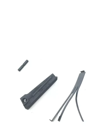 Taurus PT 1911 45 acp, pistol parts, mainspring housing, pin, and spring - Image 2