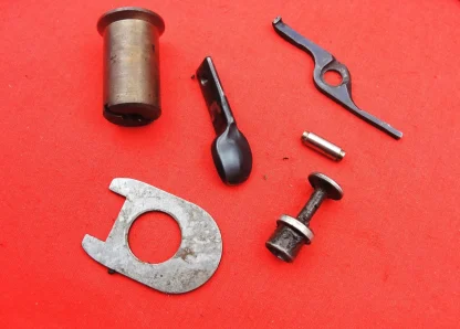 Remington 1100 12 Ga Shotgun parts: Bolt Handle, Action Spring Tube, Stock Plate