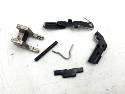 Smith & Wesson SW40V .40 S&W, Pistol Parts: Slide Stop, Lever, Barrel Stop, Pin, Mag Catch, Spring - Image 2