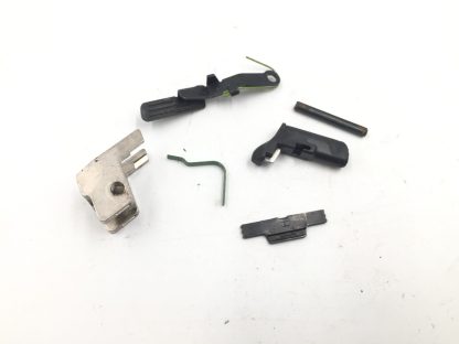 Smith & Wesson SD40VE, .40S&W, Pistol Parts: Slide Stop, Mag Catch, Lever, Barrel Stop, Spring - Image 2