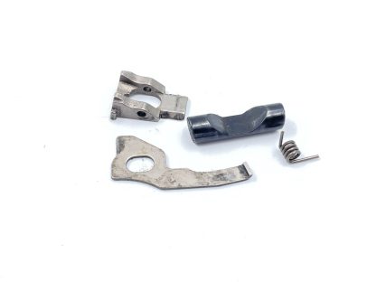 Springfield XDS-9 9mm pistol parts, mag. release button, catch, spring, and lever