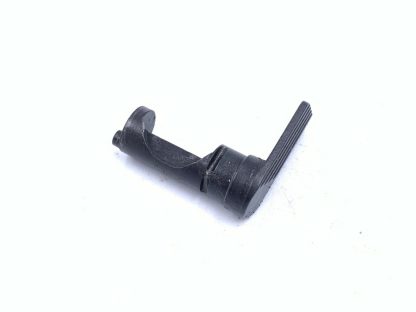 Springfield Armory XDM 40 S&W pistol parts: ejector, slide stop, lever, spring - Image 4