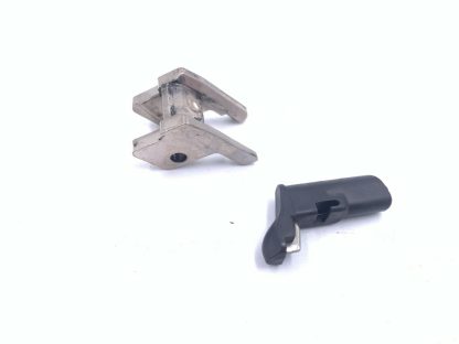 Smith & Wesson SD40VE .40S&W, pistol parts: lever and mag catch