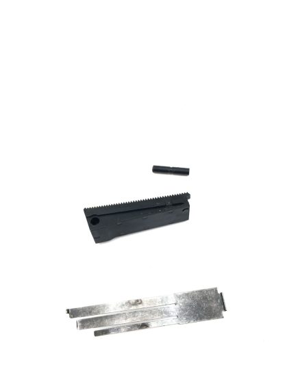Kimber Custom II 1911 45 acp, pistol parts, mainspring housing (plastic), pin, and spring - Image 2