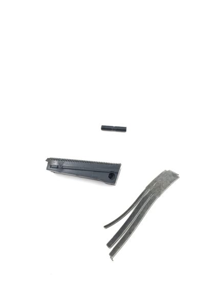 Kimber Custom II 1911 45 acp, pistol parts, mainspring housing (plastic), pin, and spring - Image 3