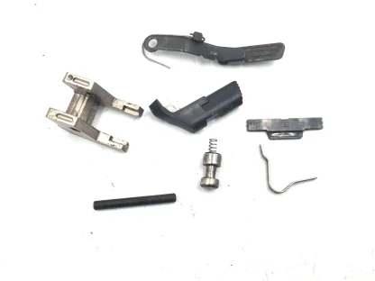 Smith & Wesson SW40 VE, 40 S&W Pistol Parts: Slide Stop, Lever, Mag Catch, Pin