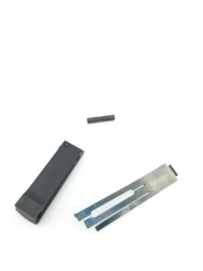 Colt Government Model 1911 45 acp, pistol parts, mainspring housing, spring, pin