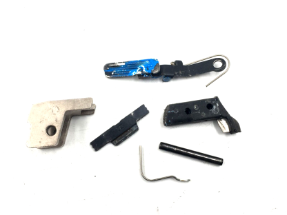 Smith & Wesson SD40VE .40 S&W, Pistol Part: Slide Stop, Lever, Mag Catch, Pin, Spring, Barrel Stop