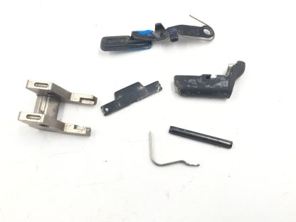 Smith & Wesson SD40VE .40 S&W, Pistol Part: Slide Stop, Lever, Mag Catch, Pin, Spring, Barrel Stop - Image 3