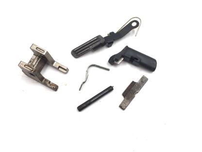 Smith & Wesson SD40VE .40S&W, Pistol Parts: Lever, Mag Catch, Slide Stop, Pin, Barrel Stop, Spring