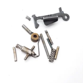 Bryco Jennings Nine 9mm, pistol parts, safety, lever, spacer, pins and springs