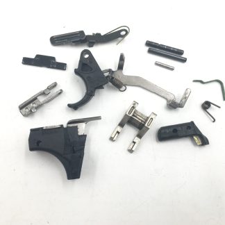 Smith & Wesson SD40VE .40S&W, Pistol Parts: Trigger, Slide Stop, Mag Catch, Pins, Springs, Lever, Housing