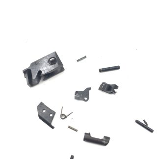 Sig Sauer P239 9mm, pistol parts, insert, ejector, magazine catch(appears to be missing parts), pins, springs, levers